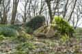 Statue of girl lying on the ground in the lost gardens of Heligan near Mevagissey Royalty Free Stock Photo
