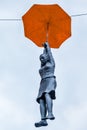 Statue of a girl with an umbrella in Prague