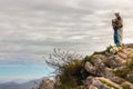 Statue of God Mother with Jesus baby in Pyrenees mountains, France. Sculpture of Our Lady with Jesus Christ on mountain top. Royalty Free Stock Photo