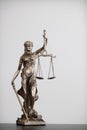 statue of god Themis Lady Justice is used as symbol of justice within law firm to demonstrate truthfulness of facts and power to Royalty Free Stock Photo