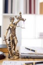 statue of god Themis Lady Justice is used as symbol of justice within law firm to demonstrate truthfulness of facts and power to