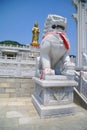 Statue of the goddess and lion in China. Dalian Royalty Free Stock Photo