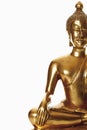 Statue of golden bhudda against white background Royalty Free Stock Photo