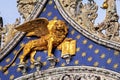 statue of a golden lion with a book in Venice. Royalty Free Stock Photo