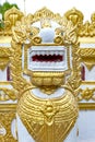 Statue of golden Singha or lion guardian Royalty Free Stock Photo