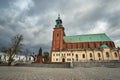 Statue and Gothic cathedral church in autumn