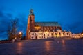 Statue and Gothic cathedral church by night Royalty Free Stock Photo