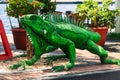 The statue of a green iguana on the streets of Willemstad, Curacao Royalty Free Stock Photo