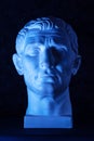 Statue of Guy Julius Caesar Octavian Augustus. Creative concept colorful neon image with ancient roman sculpture Guy