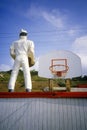 Statue of hamburger chef with Basketball goal in background, Malibu, CA Royalty Free Stock Photo
