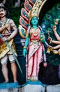 Statue Hindu deities on the roof of temple within Batu Caves. Batu Caves - a complex of limestone caves in Kuala Lumpur, Malesia Royalty Free Stock Photo