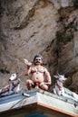 Statue Hindu deities on the roof of temple within Batu Caves. Batu Caves - a complex of limestone caves in Kuala Lumpur, Malesia Royalty Free Stock Photo