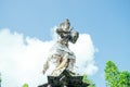 Statue of Hindu God Indra Bringing Holy Water at Tirta Empul, Bali - Indonesia