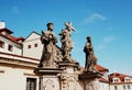 Statue of the Holy Savior with Cosmas and Damian on Charles Bridge in Prague, Czech Republic Royalty Free Stock Photo