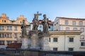Statue of Holy Savior with Cosmas and Damian at Charles Bridge - Prague, Czech Republic Royalty Free Stock Photo