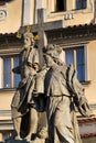 Statue of Holy Savior with Saints Cosmas and Damian detail on Charles Bridge, Prague, Czech Republic Royalty Free Stock Photo