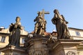 Statue of Holy Savior with Saints Cosmas and Damian detail on Charles Bridge, Prague, Czech Republic Royalty Free Stock Photo