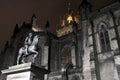 Statue in Edinburgh at night near cathedral