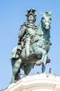 a statue of a horse rider riding on top of a building Royalty Free Stock Photo