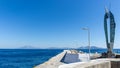 The statue of Icarus on the port of Aghios kirikos of the island of Ikaria Greece Royalty Free Stock Photo