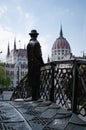 Statue of Imre Nagy facing the Hungarian Parliament Building - OrszÃÂ¡ghÃÂ¡z in Martyrs` Square Budapest, Hungary