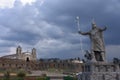 A statue of Inca Pachacutec and Catholic church in Vilcashuaman. Ayacucho, Peru