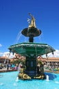 Statue of Inca Pachacutec on fountain and catholic church on Plaza de Armas, evening view, Cusco or Cuzco town, Peru at night,