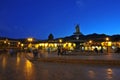 Statue of Inca Pachacutec on fountain and catholic church on Plaza de Armas, evening view, Cusco or Cuzco town, Peru