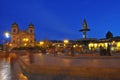 Statue of Inca Pachacutec on fountain and catholic church on Plaza de Armas, evening view, Cusco or Cuzco town, Peru