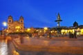 Statue of Inca Pachacutec on fountain and catholic church on Plaza de Armas, evening view, Cusco or Cuzco town, Peru