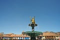 Statue of Inca Pachacutec on fountain and catholic church on Plaza de Armas, view,( Cusco or Cuzco )