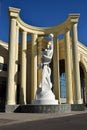 A statue inside a half-rotunda