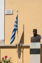 Statue of Ioannis Dafotis and a greek flag