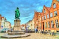 Statue of Jan van Eyck, an Early Netherlandish painter in Bruges, Belgium