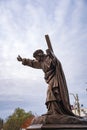 Statue of Jesus carrying a cross near the Church of the Catholic Jesuits Royalty Free Stock Photo