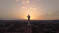 Statue of Jesus Christ along with the sun divinely rising from his chest.Cristo de Monteagudo, Murcia, Spain. aerial video at