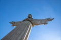 Statue of Jesus Christ, Cristo Rei, standing atop a hill in Lisbon, Portugal