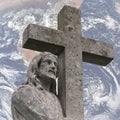 The statue of Jesus Christ with a cross. Planet earth on background self-sacrifice concept, power of faith