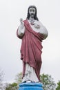 The statue of Jesus Christ. He points a finger at his heart. religion, faith concept