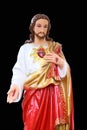 Statue of Jesus Christ. Sacred Heart. Christianity symbol isolated on black background Royalty Free Stock Photo