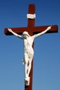 Statue of Jesus Christ on wood cross Royalty Free Stock Photo