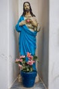 Statue of Jesus with his holy heart hillside cemetery, Amalfi Town, Italy