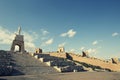 Statue of Jesus and remains of a ancient city walls