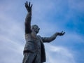 Statue of Jim Larkin on O`Connell street, Dublin, Ireland against blue sky