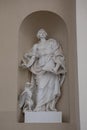 Statue of John the Apostle on the wall of Vilnius Cathedral, Lithuania Royalty Free Stock Photo