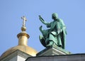 Statue of John with an eagle on the roof of St. Isaac's Cathedral