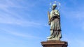 Statue of John of Nepomuk on Charles Bridge in Prague Royalty Free Stock Photo