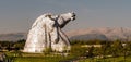 Statue of Kelpies in the form of two huge horses guarding the Ochil Hills