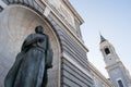 Statue with key in hand on Palacio Real, Madrid, Spain Royalty Free Stock Photo
