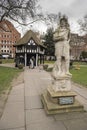 Statue of King Charles II and building in Soho Square London.